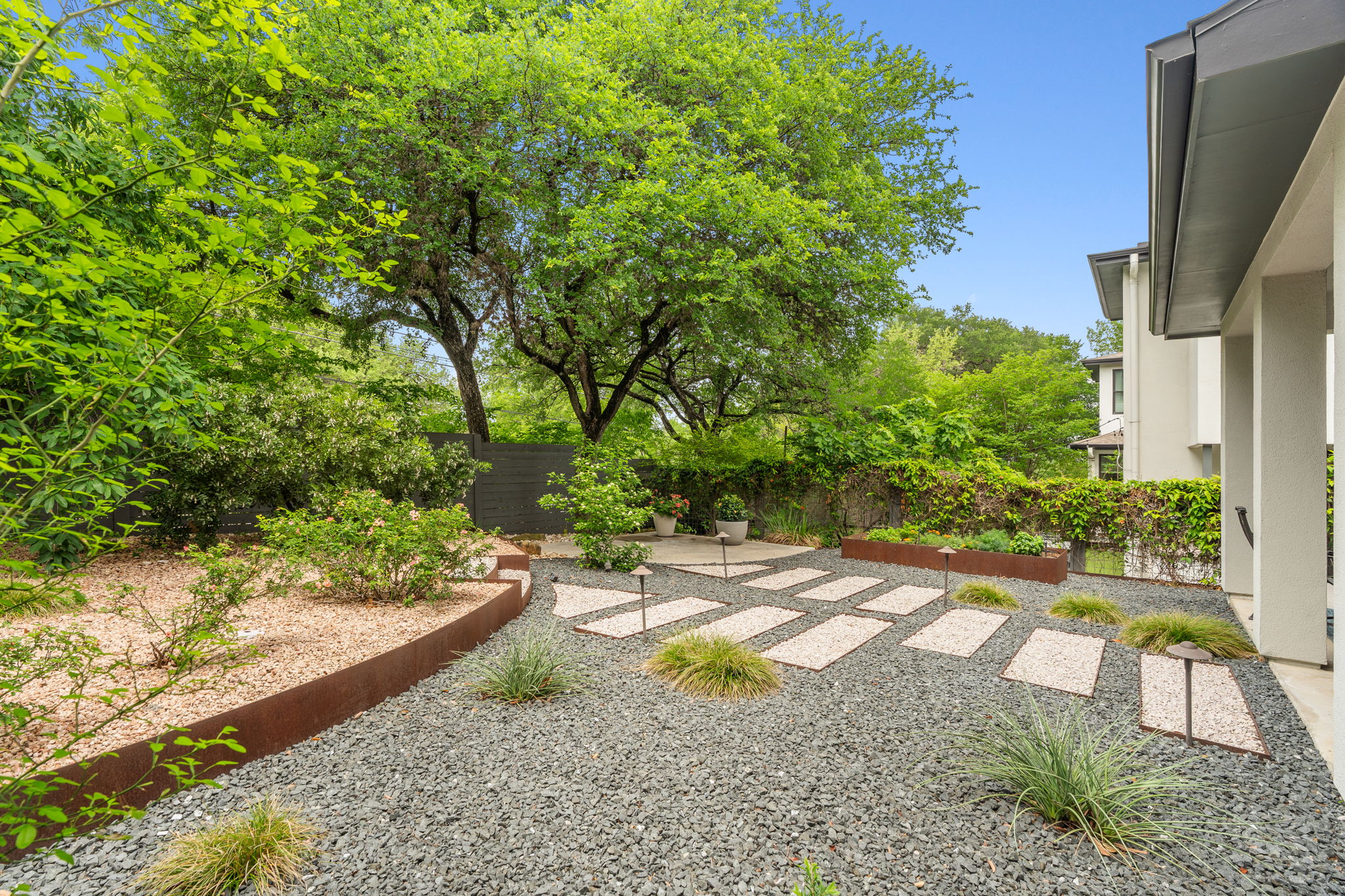 1303 Azie Morton Road, Unit 2 Austin, TX 78704 - Photo 31 of 36 a view of backyard with outdoor seating