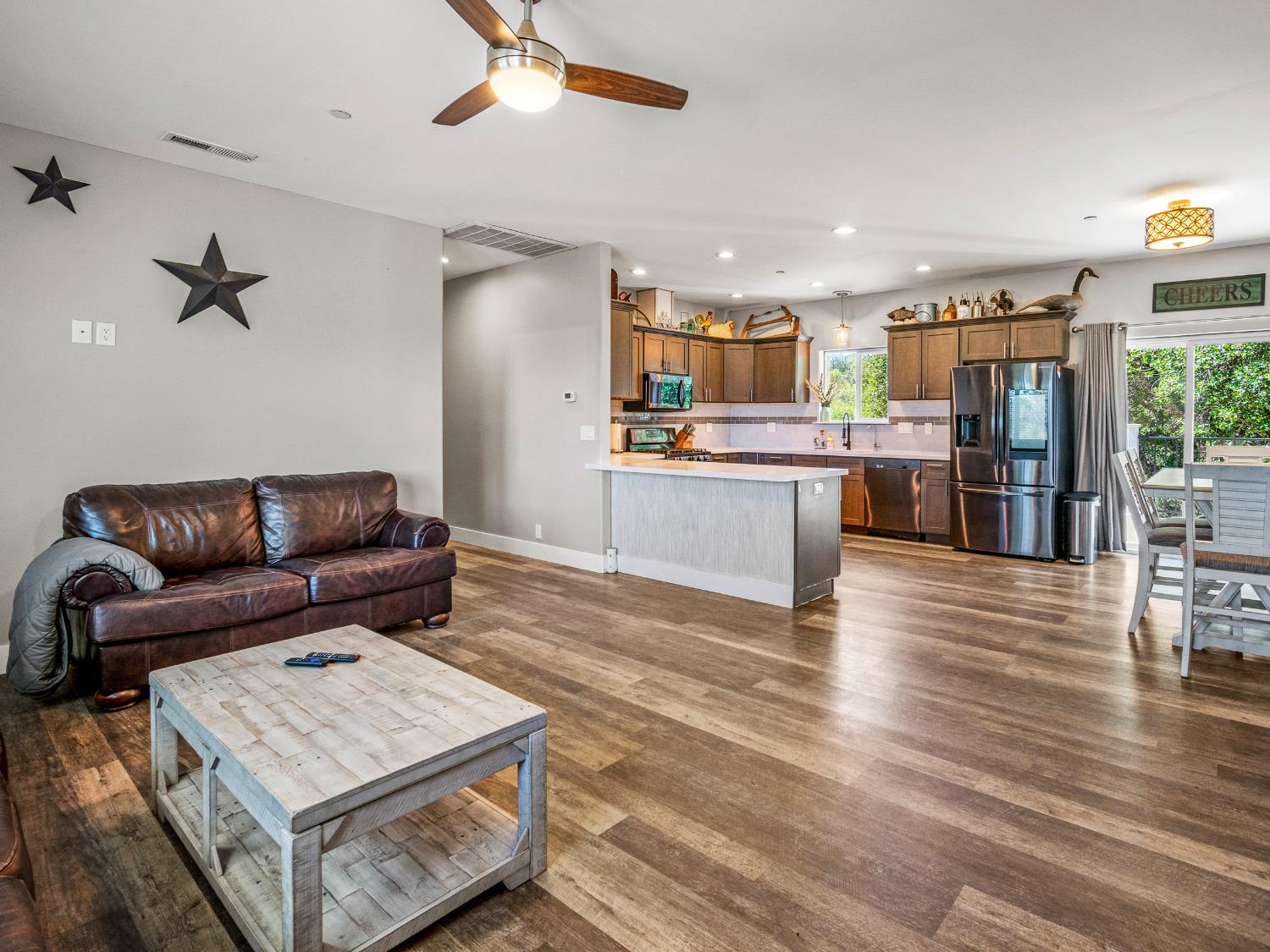 3924 Pine Cone Drive Rescue, CA 95672 - Photo 36 of 51 a living room with stainless steel appliances furniture and a kitchen view
