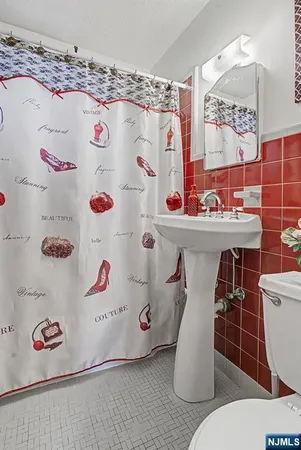 a bathroom with a sink and a toilet