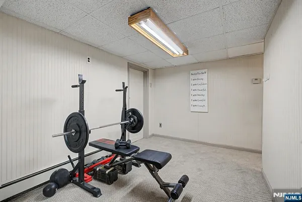 a view of a deck with wooden floor and outdoor seating