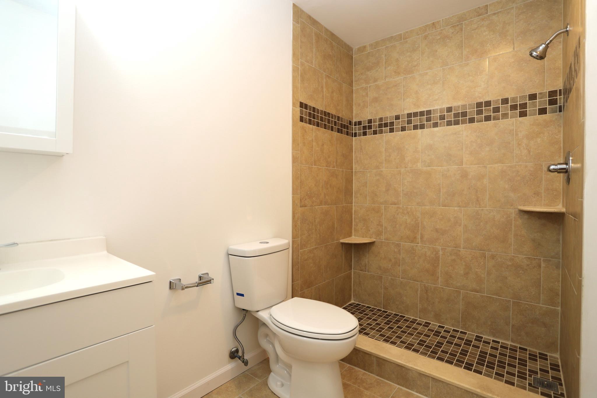 14459 Norman Road Culpeper, VA 22701 - Photo 20 of 23 a bathroom with a toilet and a shower