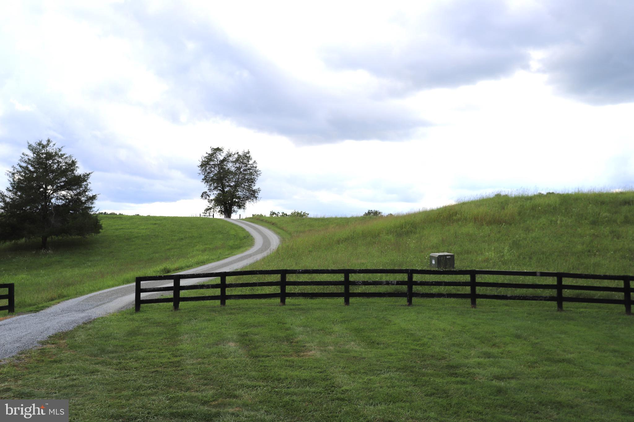 14459 Norman Road Culpeper, VA 22701 - Photo 4 of 23 a view of a lake with outdoor space