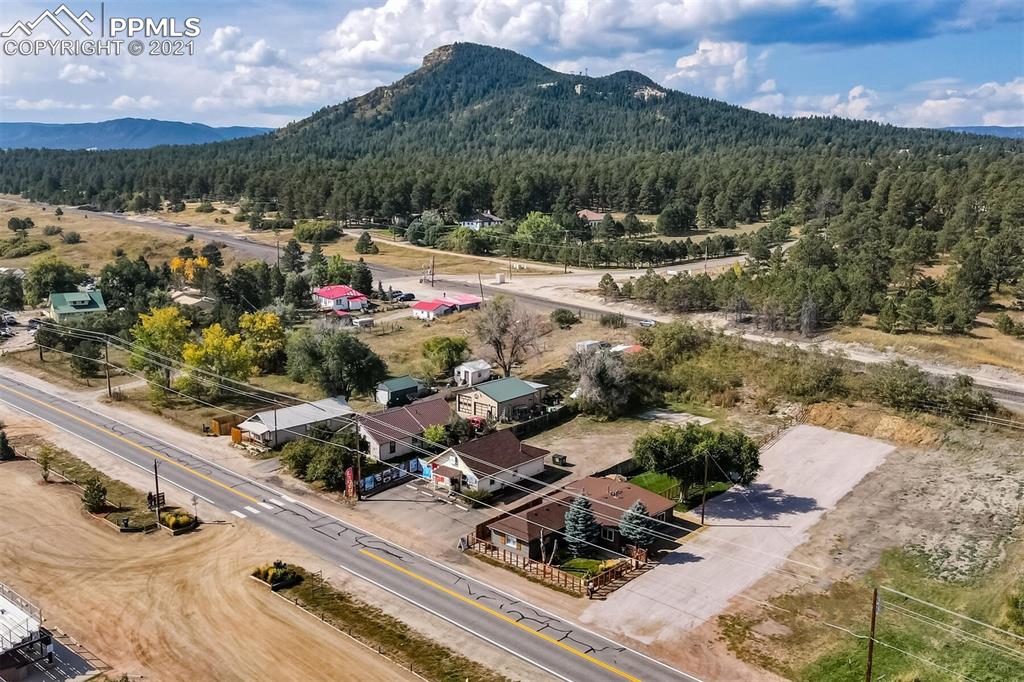8977 Spruce Mountain Road Larkspur, CO 80118 - Photo 48 of 50 a view of a lake with a mountain