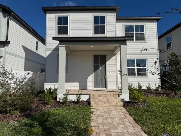 a house view with a garden space