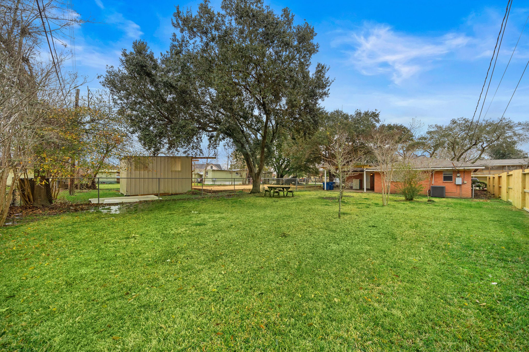 712 Damon Street Rosenberg, TX 77471 - Photo 11 of 11 a view of a house with a big yard