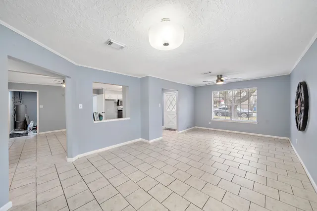 a view of an empty room and window