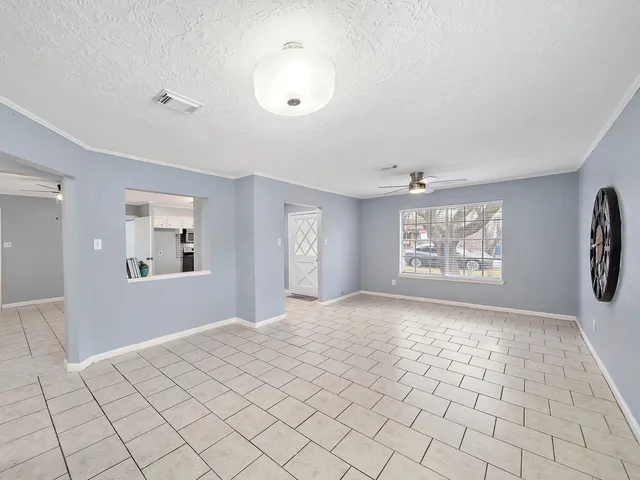 a view of an empty room and window