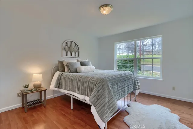 a view of a livingroom with wooden floor