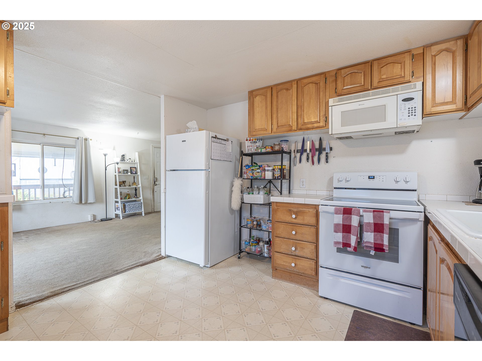 287 Canyon View Drive Lafayette, OR 97127 - Photo 30 of 33 a kitchen with stainless steel appliances a refrigerator and cabinets