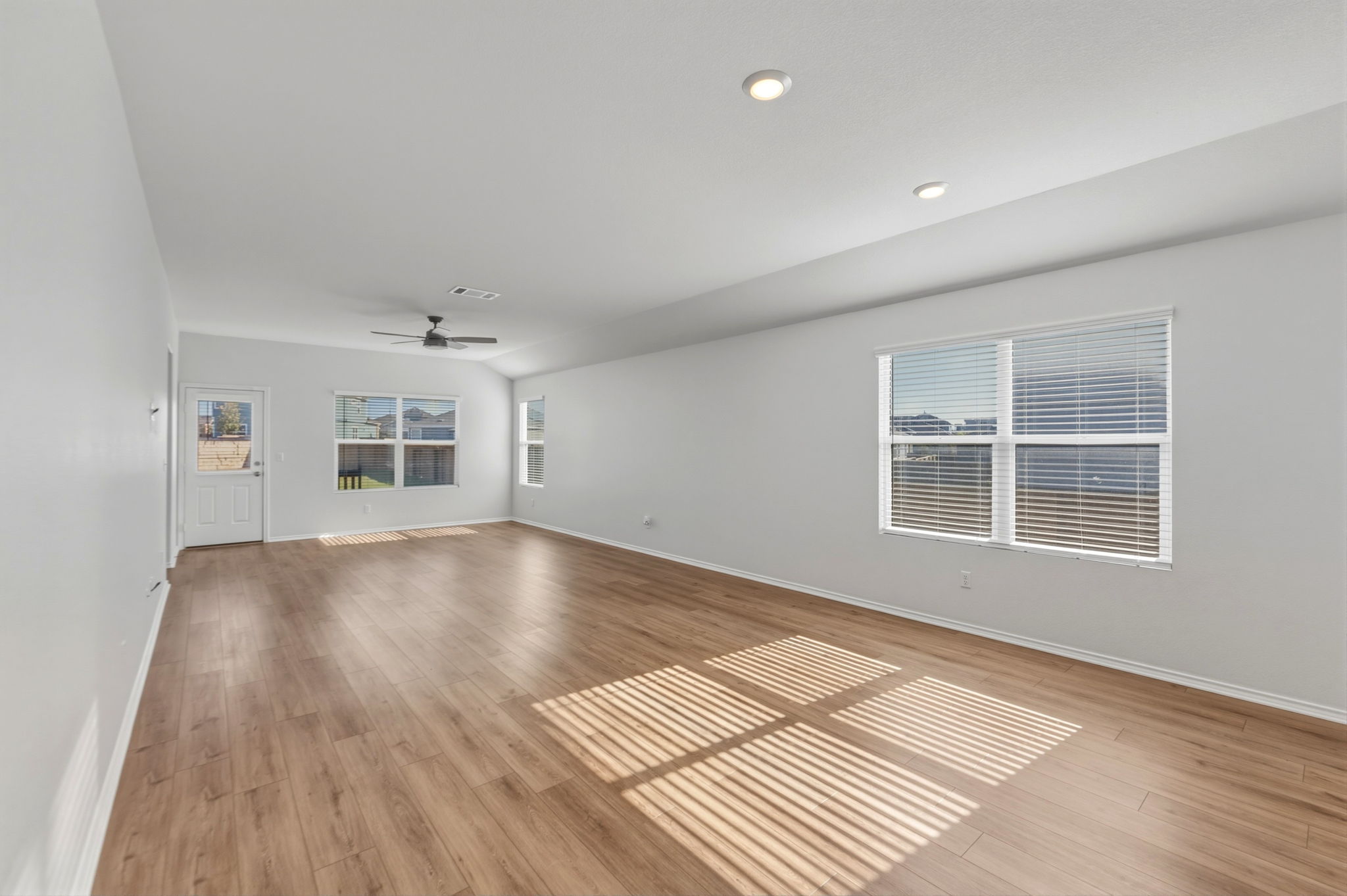 405 Doherty Kyle, TX 78640 - Photo 13 of 40 Spacious den area with plenty of natural light