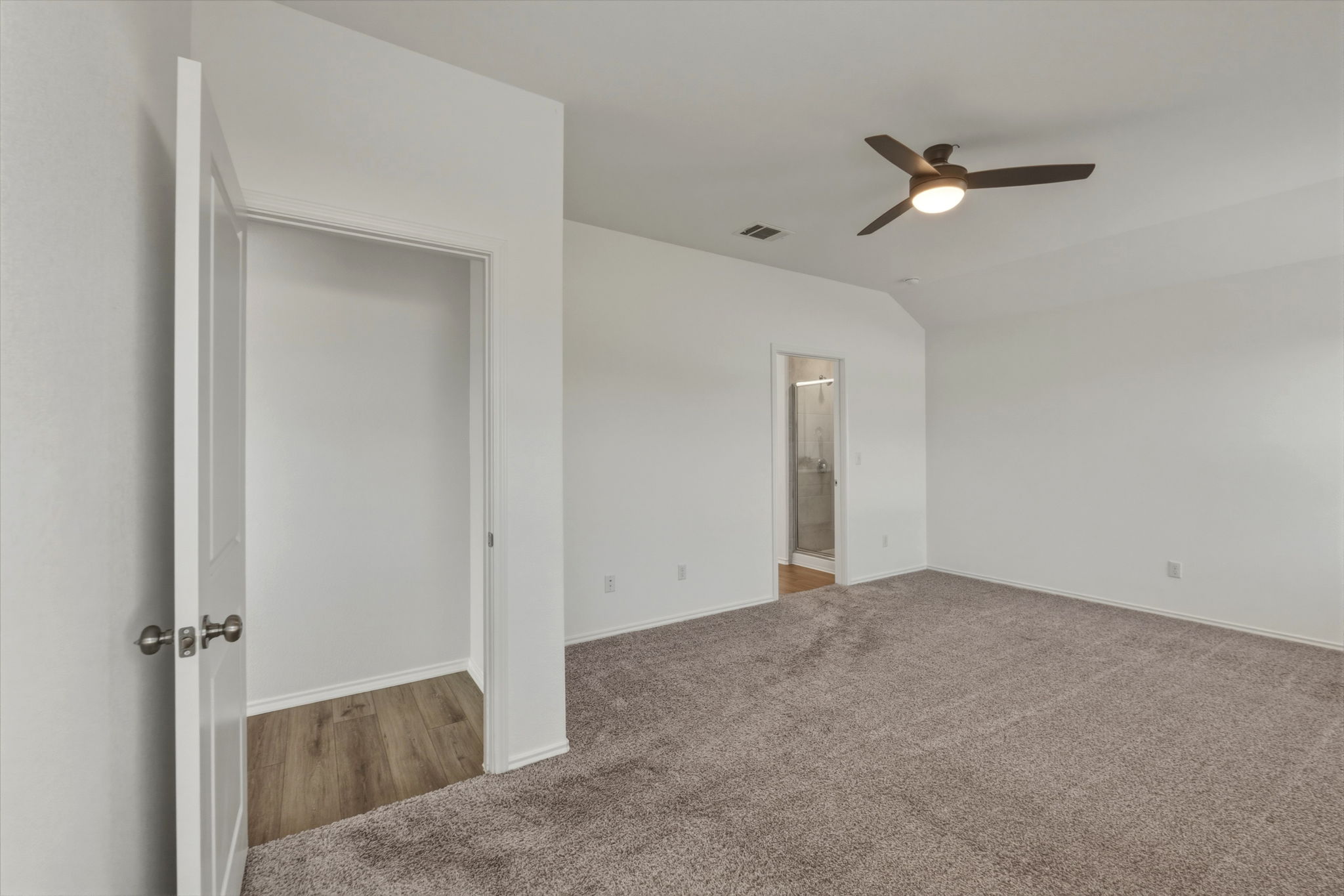 405 Doherty Kyle, TX 78640 - Photo 27 of 40 Primary bedroom with walk in closet and spacious bathroom