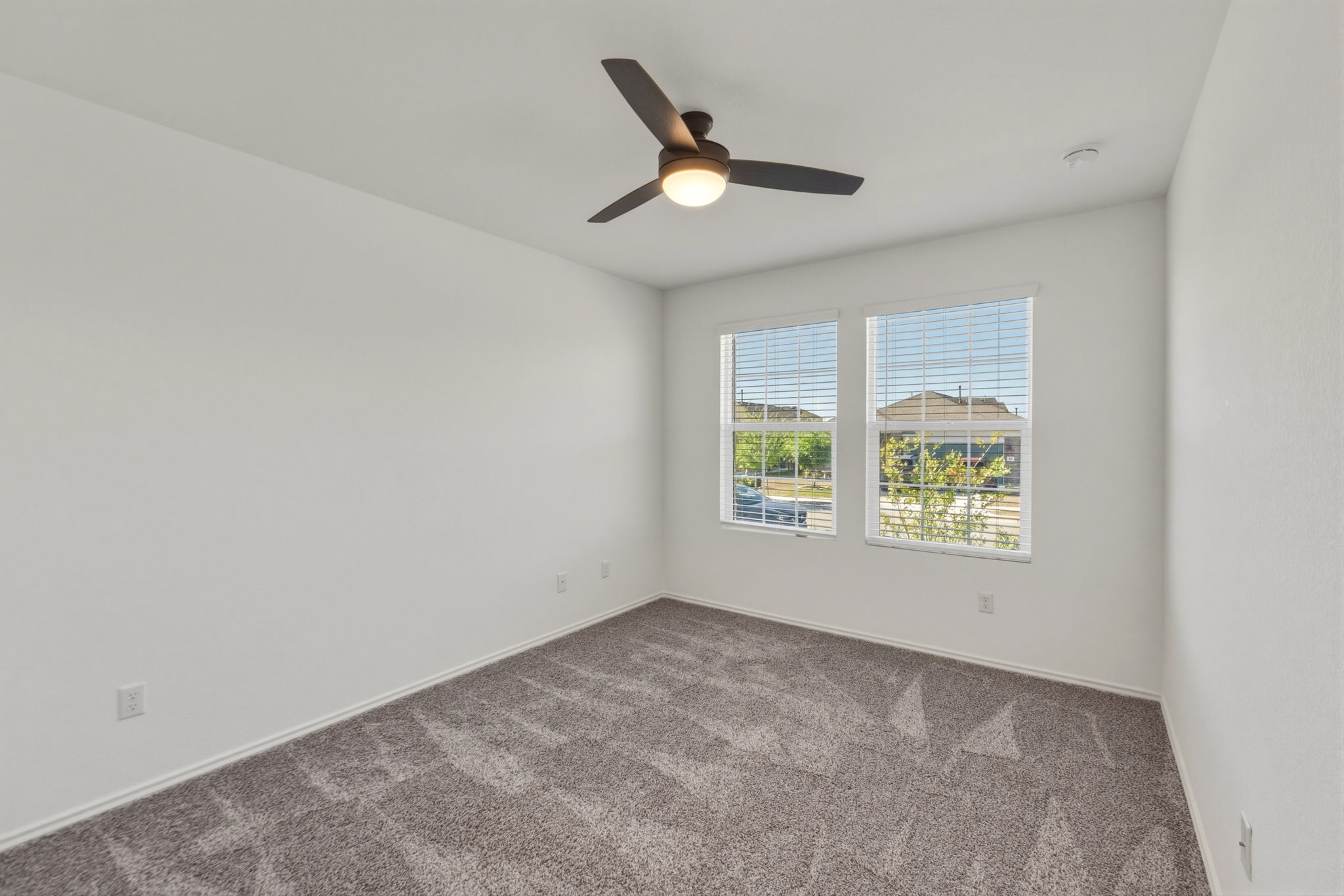 405 Doherty Kyle, TX 78640 - Photo 6 of 40 Secondary bedroom with natural light