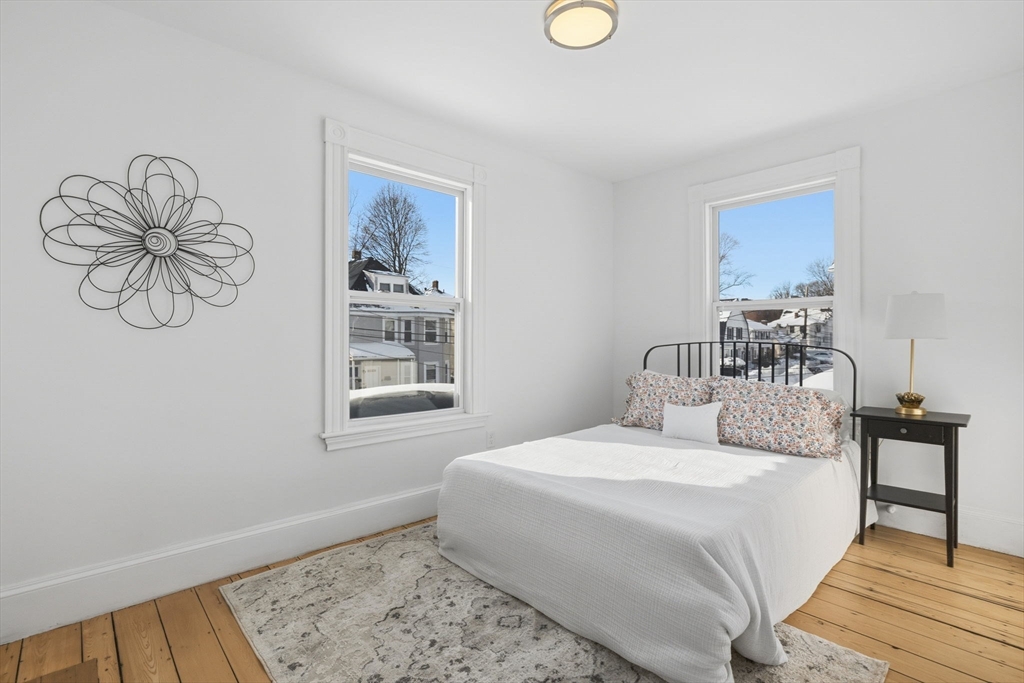 30 Massasoit Street Boston, MA 02136 - Photo 11 of 22 a bedroom with a bed and a window