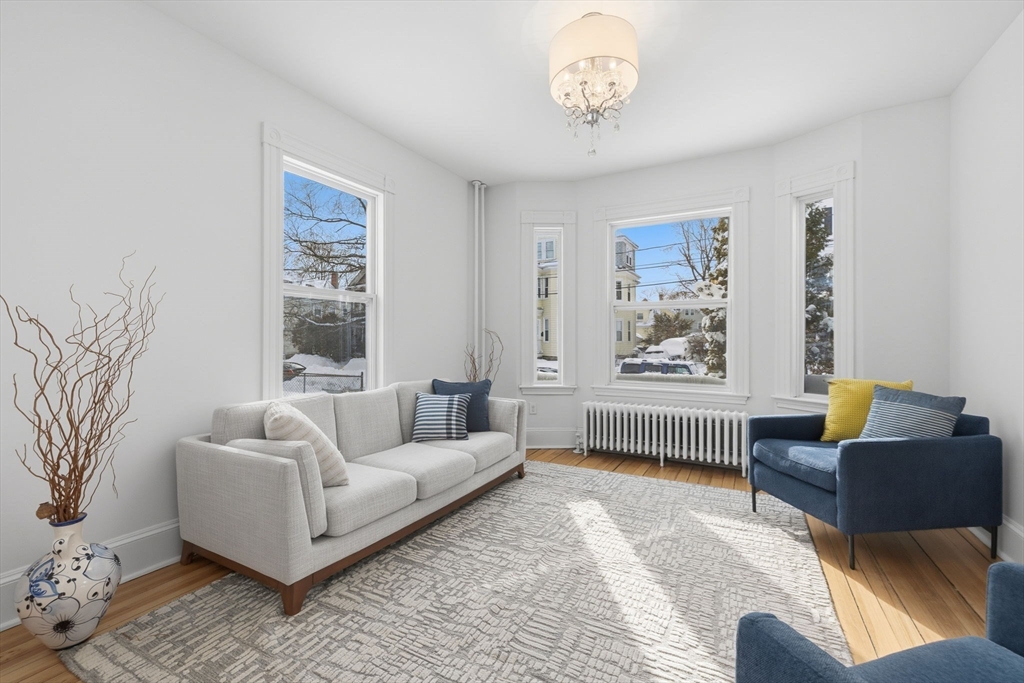 30 Massasoit Street Boston, MA 02136 - Photo 4 of 22 a living room with furniture and a window