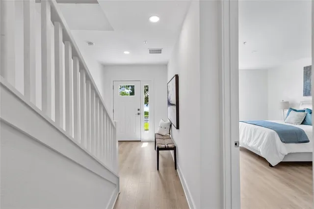 a view of a bedroom from a hallway