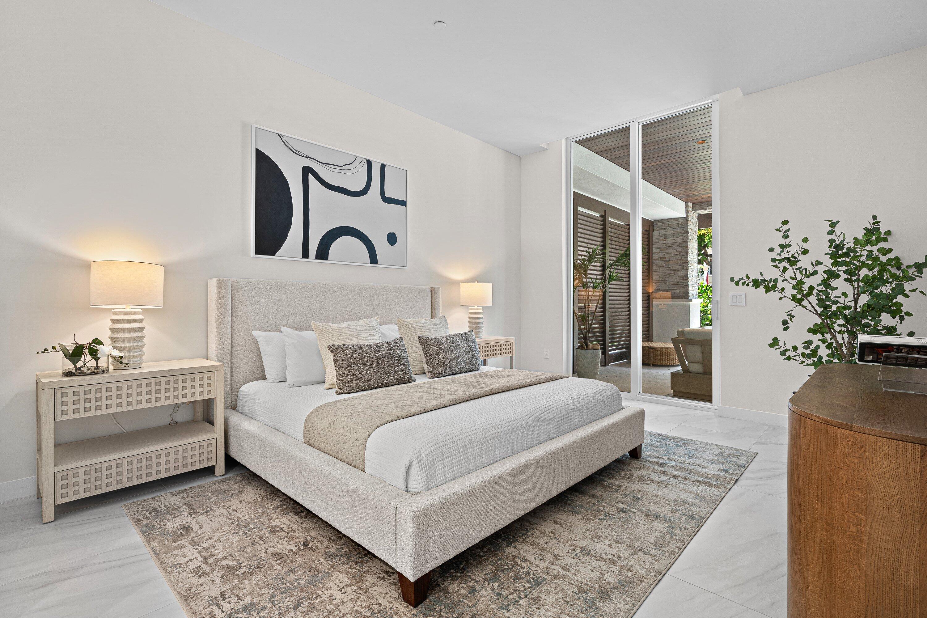220 Southeast Mizner Boulevard, Unit 102 Boca Raton, FL 33432 - Photo 11 of 55 Primary Bedroom
