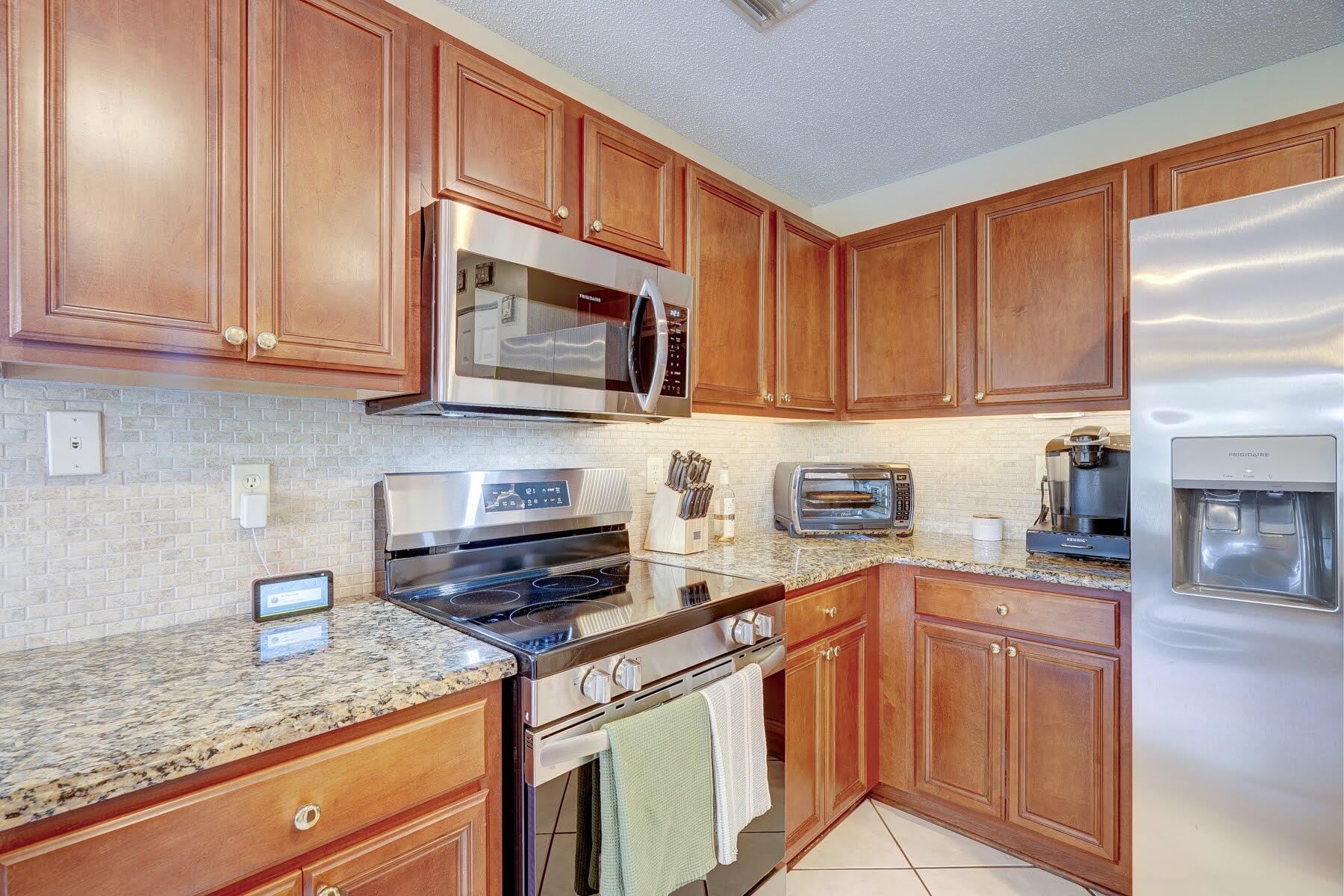 254 Timberwalk Trail Jupiter, FL 33458 - Photo 12 of 45 new stainless steel appliances