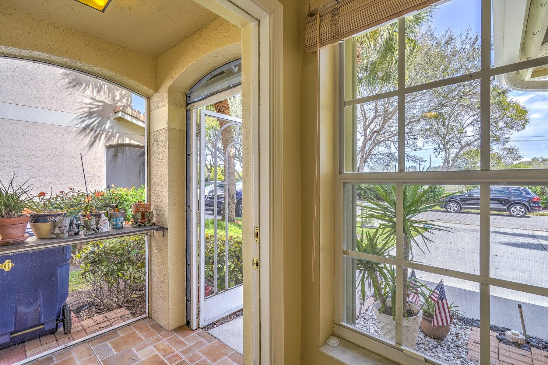 254 Timberwalk Trail Jupiter, FL 33458 - Photo 4 of 45 screened in front patio