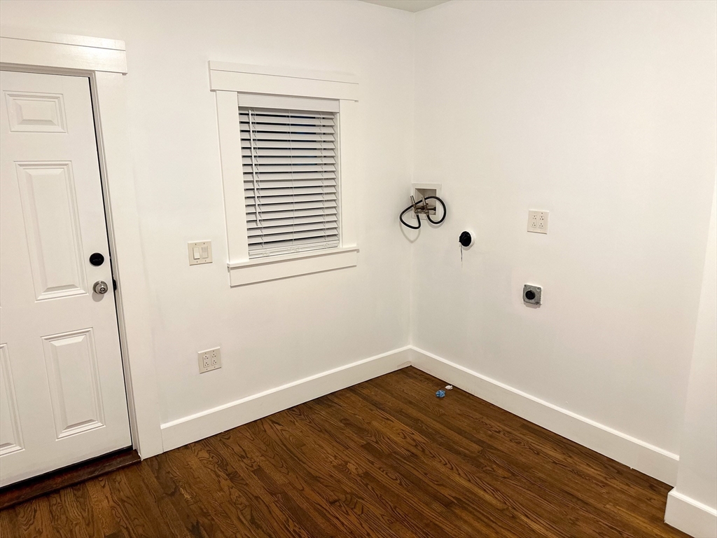 125 Maple Street Carlisle, MA 01741 - Photo 14 of 35 a view of a small space with wooden floor and a window