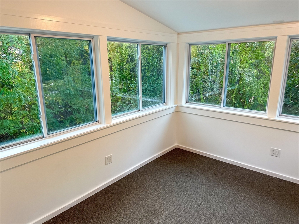 125 Maple Street Carlisle, MA 01741 - Photo 18 of 35 an empty room with a window