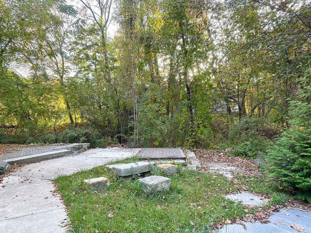 125 Maple Street Carlisle, MA 01741 - Photo 24 of 35 a view of a backyard