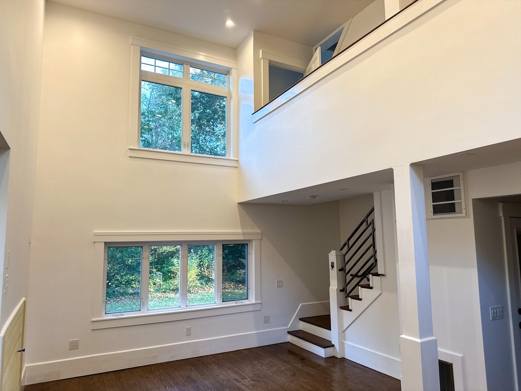 125 Maple Street Carlisle, MA 01741 - Photo 10 of 35 a view of an entryway with wooden floor