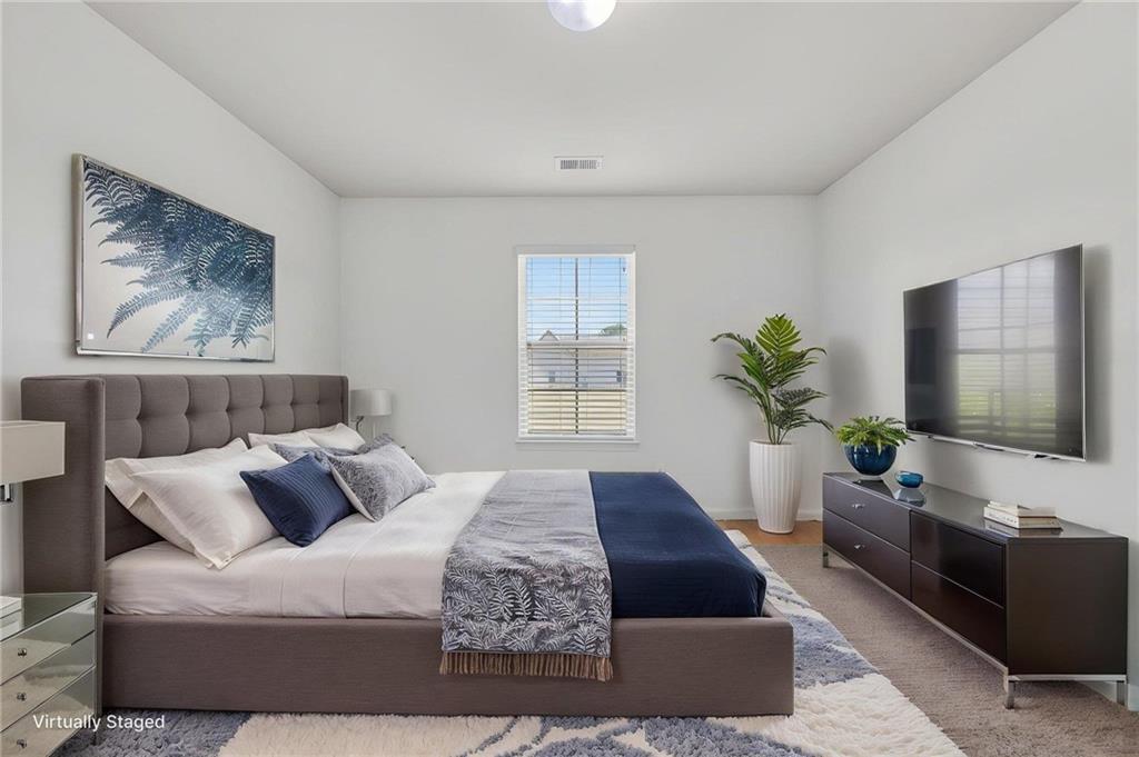 214 Millie Court Jackson, GA 30233 - Photo 39 of 61 a living room with furniture and a flat screen tv