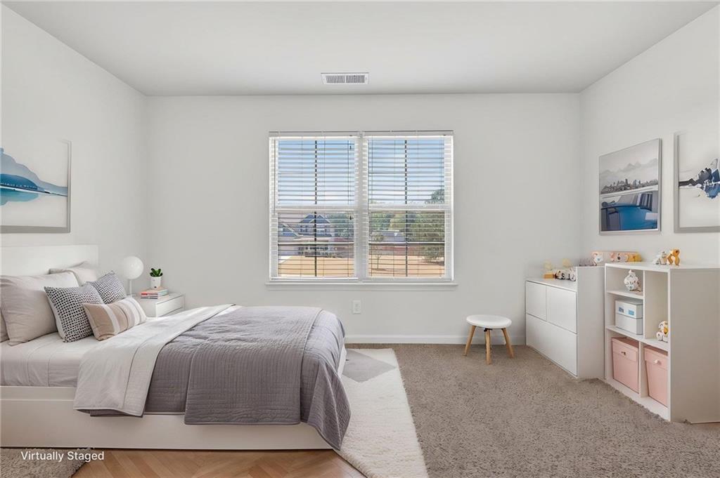 214 Millie Court Jackson, GA 30233 - Photo 45 of 61 a bedroom with a bed and a window