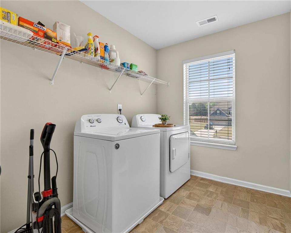 214 Millie Court Jackson, GA 30233 - Photo 47 of 61 a utility room with dryer and washer