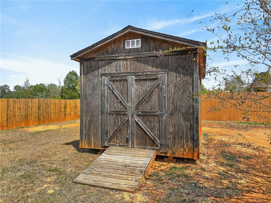 214 Millie Court Jackson, GA 30233 - Photo 57 of 61 a front view of a house with a yard