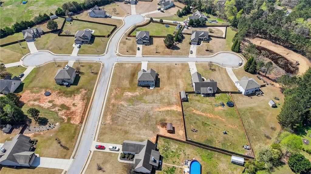 214 Millie Court Jackson, GA 30233 - Photo 61 of 61 an aerial view of a house with a swimming pool