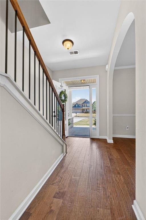 214 Millie Court Jackson, GA 30233 - Photo 9 of 61 a view of an entryway with wooden floor