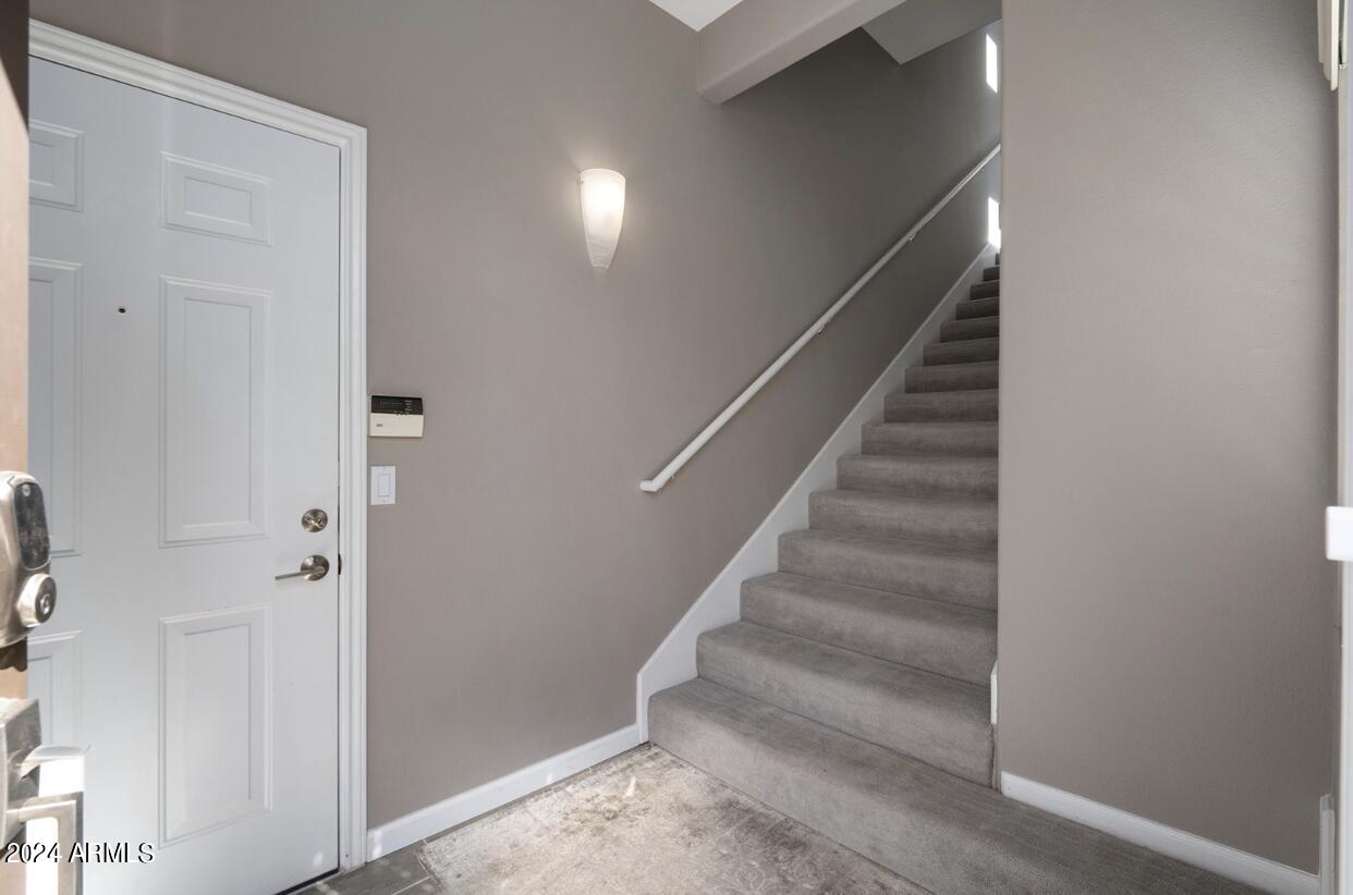 8245 East Bell Road, Unit 217 Scottsdale, AZ 85260 - Photo 43 of 46 Stairs to Living Area
