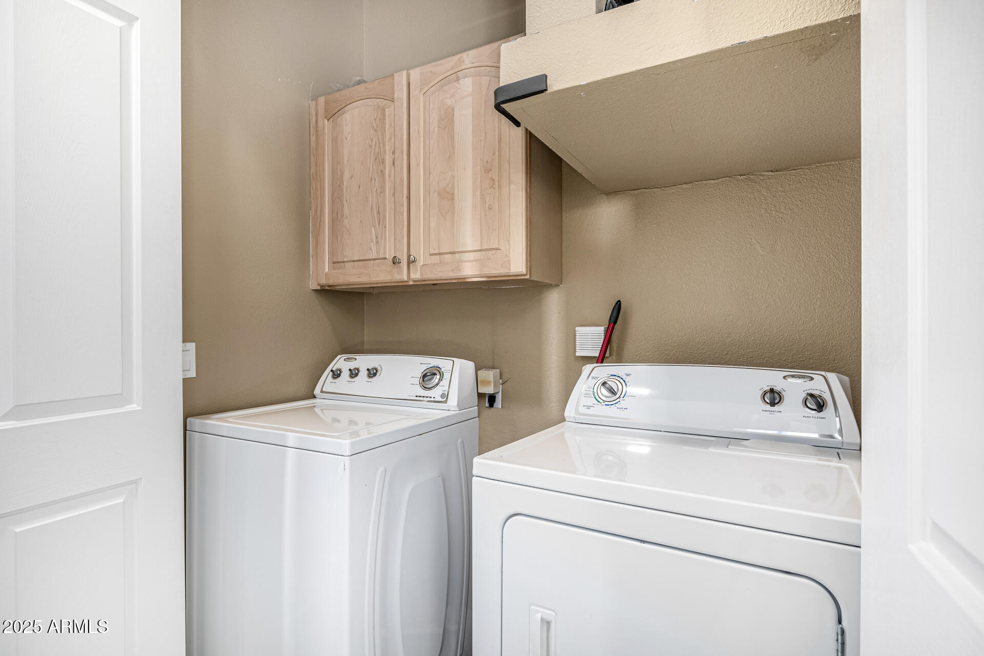 8245 East Bell Road, Unit 217 Scottsdale, AZ 85260 - Photo 45 of 46 Inside Laundry