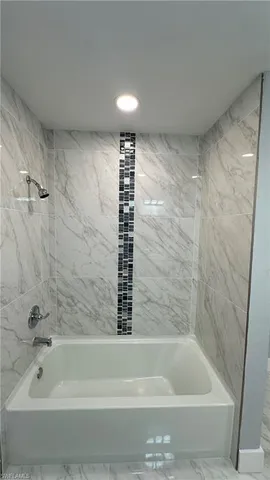 a bathroom with a bathtub