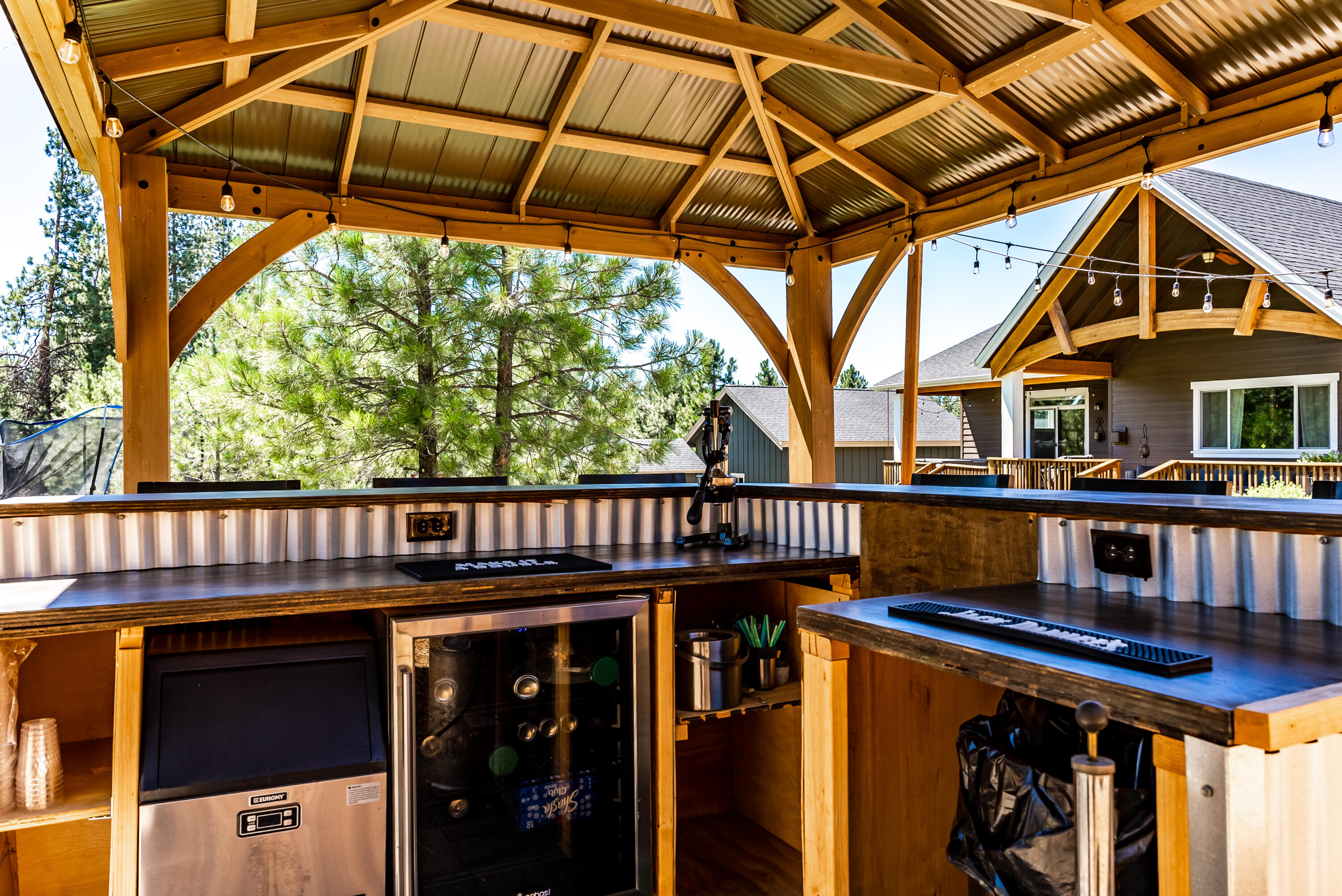 19525 Apache Road Bend, OR 97702 - Photo 37 of 47 a view of a roof deck with furniture and a tub