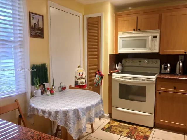 a bedroom with a bed and a sink