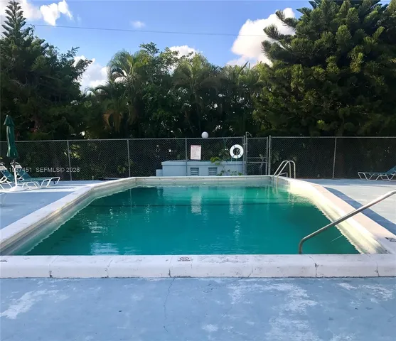 a view of swimming pool with a outdoor space