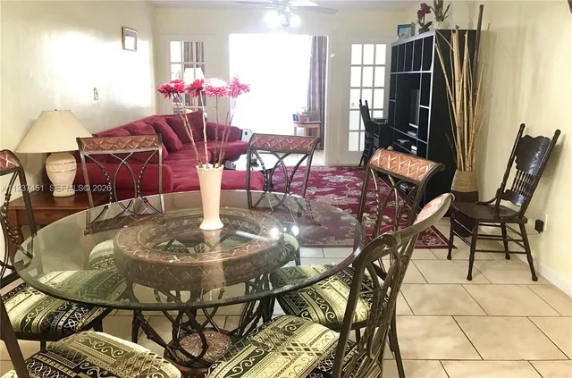 a view of a dining room with furniture