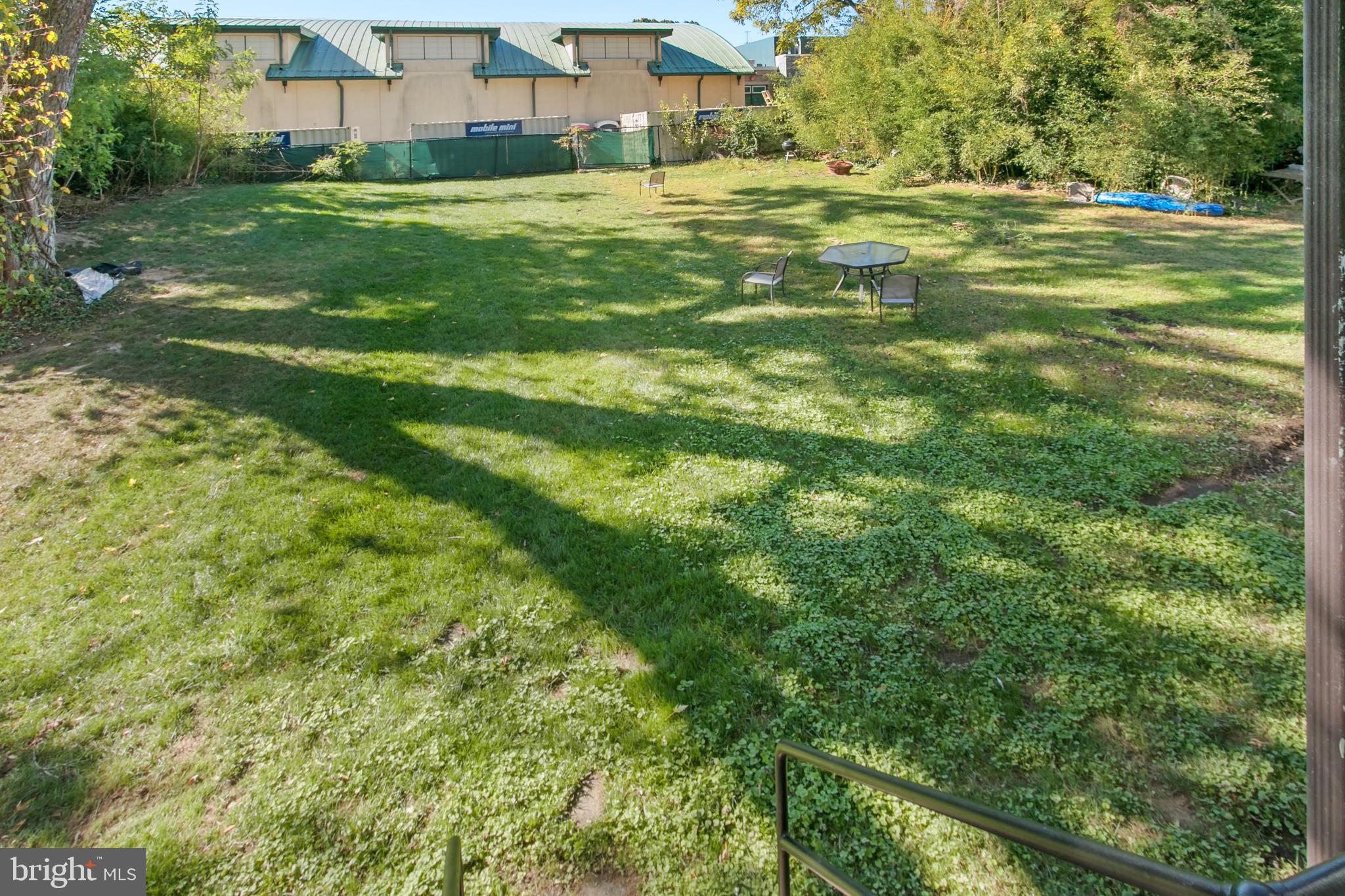 4500 MacArthur Boulevard Northwest Washington, DC 20007 - Photo 6 of 16 a view of a building with a yard