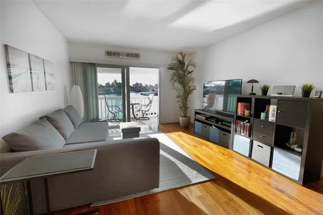 a kitchen with a refrigerator a sink and a stove