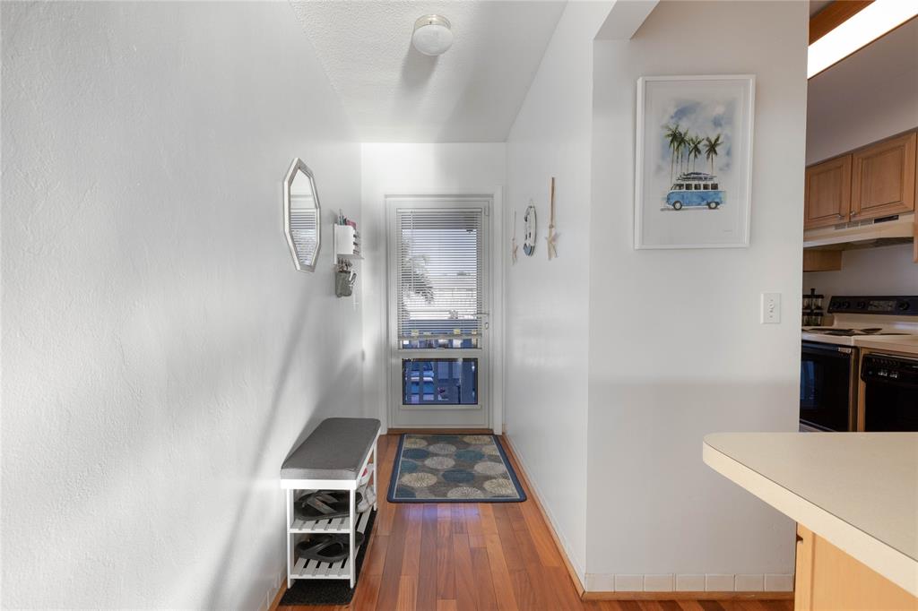 750 Pine Drive, Unit 11 Pompano Beach, FL 33060 - Photo 5 of 22 walk in closet with wooden floor