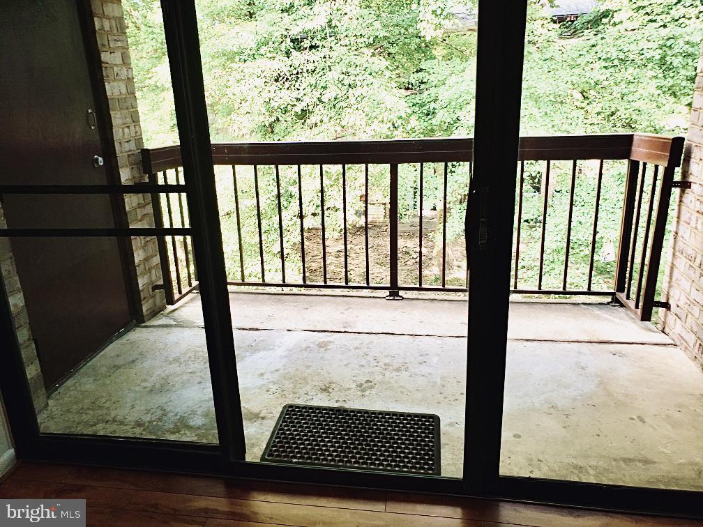 2226 Castle Rock Square, Unit 22C Reston, VA 20191 - Photo 14 of 45 BALCONY - SCENIC VIEW OF TREES AND SERENITY!