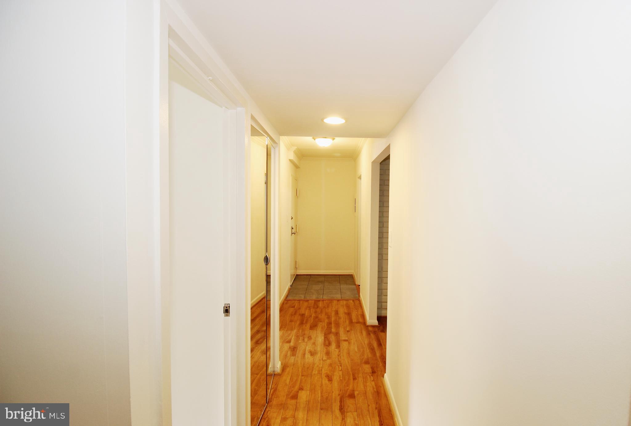 2226 Castle Rock Square, Unit 22C Reston, VA 20191 - Photo 4 of 45 foyer/hallway to front door