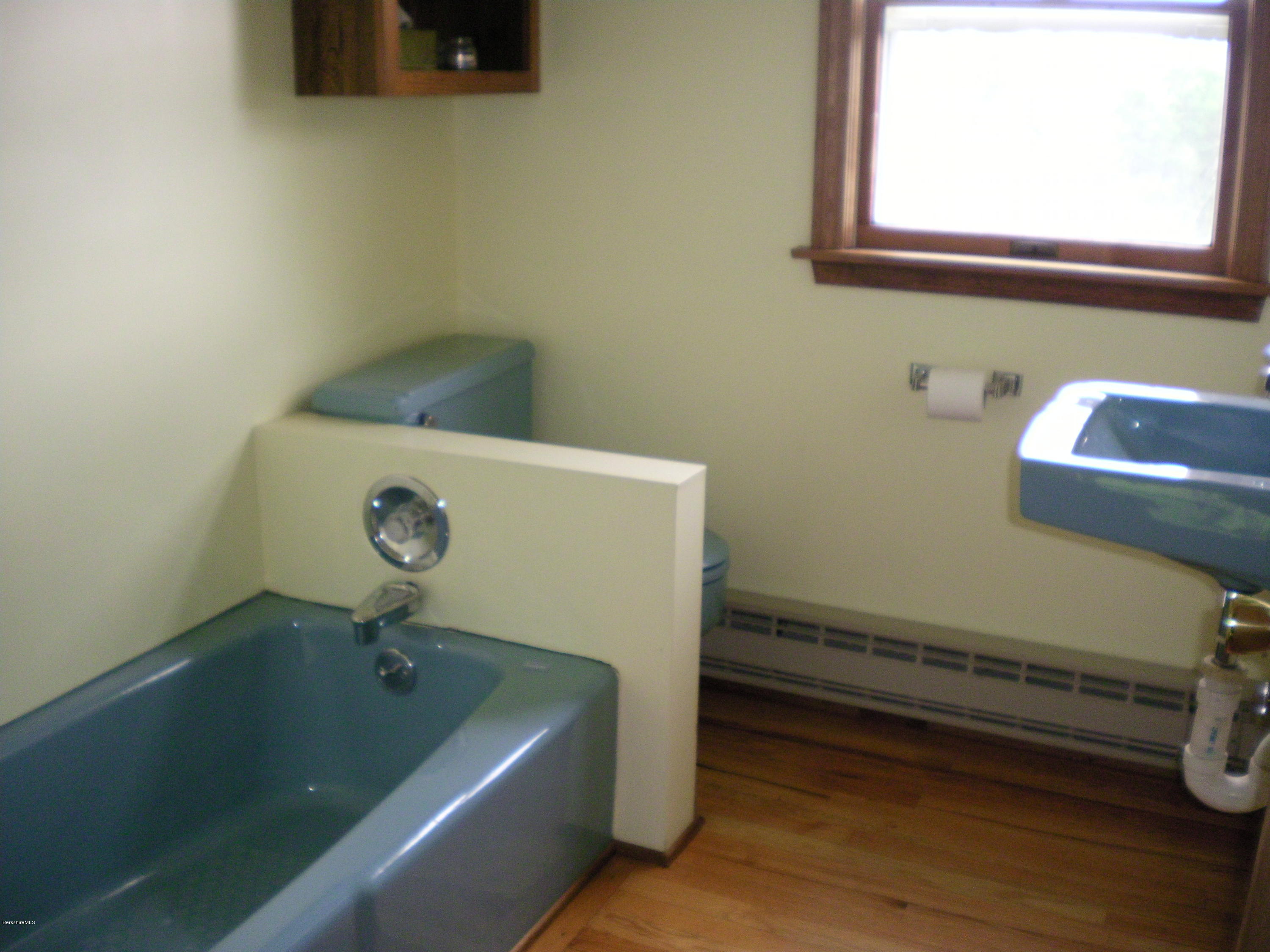 7 Pierce Road Peru, MA 01235 - Photo 24 of 29 a bathroom with a tub and a sink