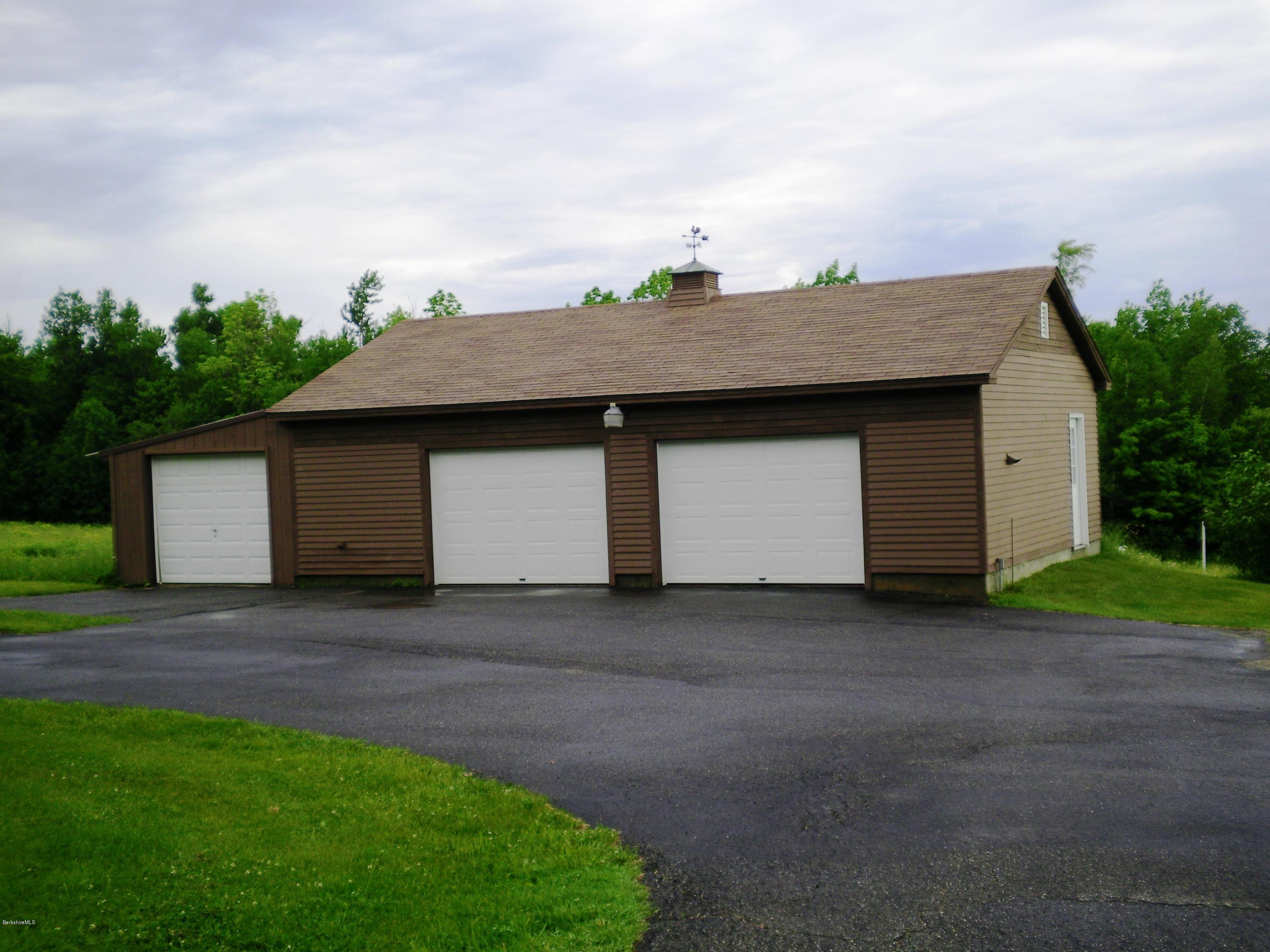 7 Pierce Road Peru, MA 01235 - Photo 4 of 29 a front view of a house with garden