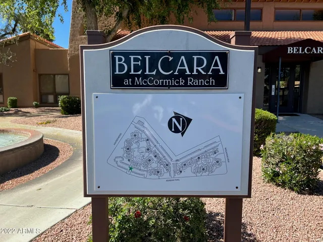 a kitchen with a stove cabinets and a sink
