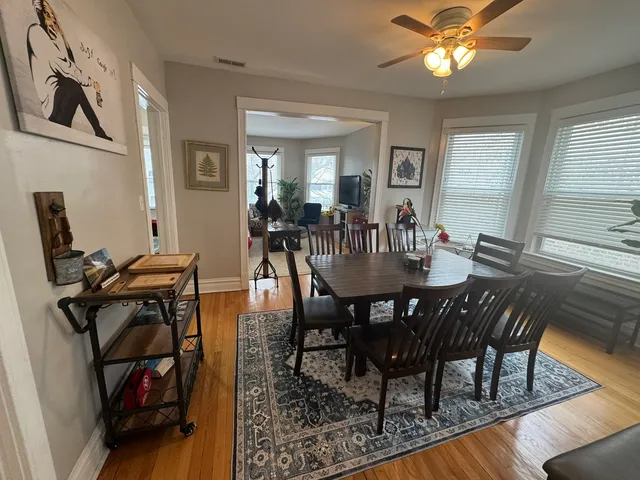 a view of a dining room with furniture