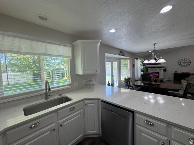 1976 River Bottom Road Springville, UT 84663 - Photo 13 of 45 Kitchen featuring crisp white cabinetry, light-colored countertops, and a stainless steel undermount sink with a gooseneck faucet