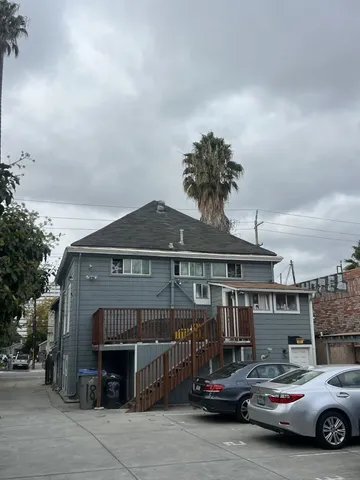 a view of street with parked cars